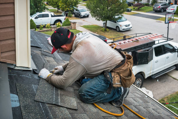 Professional Gutter Repair And Installation technician working in Whiteland, IN